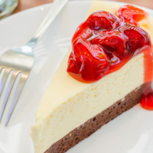 New York Style Cheesecake with Strawberry Sauce