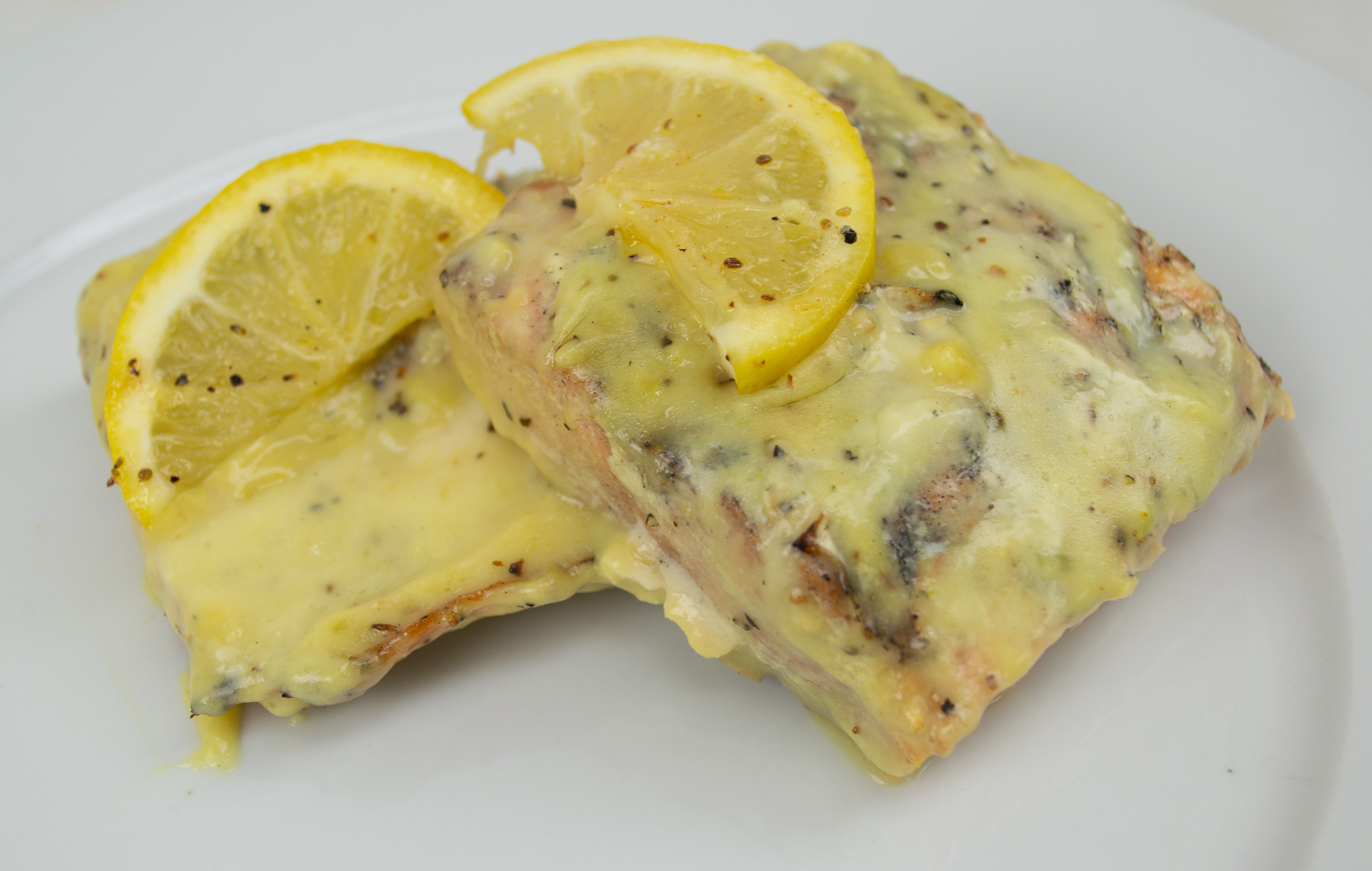 Wild Fresh Grilled Salmon with Creamy Lemon Herb Sauce Buffet